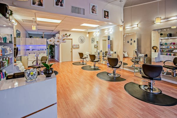 Modern hair salon interior in NSW, showcasing legal requirements for buying such a business.