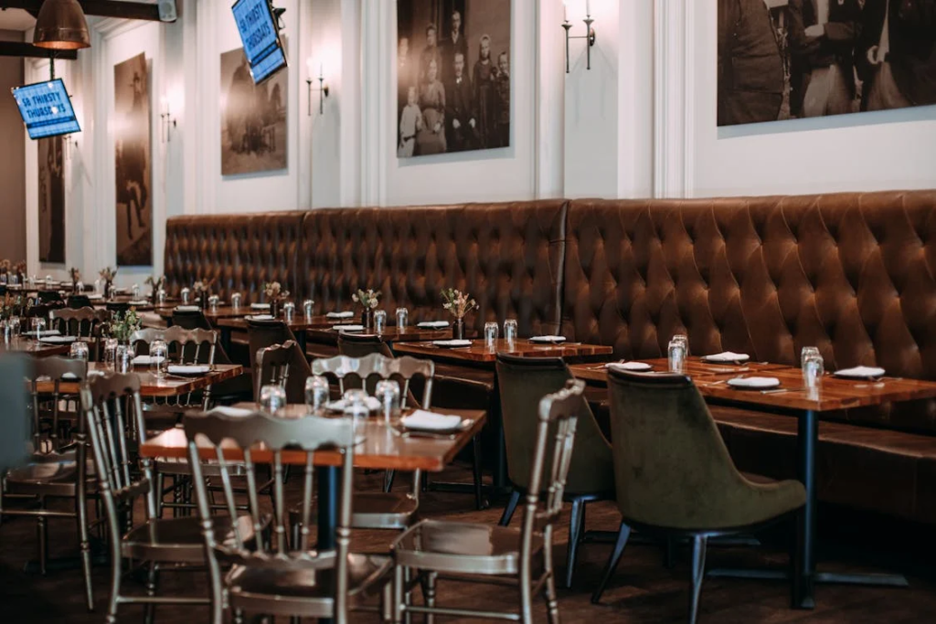 Interior of an empty restaurant in NSW, highlighting dining setup and decor, relevant to legal requirements for buying a restaurant.