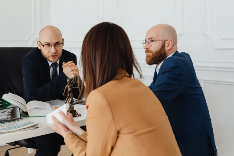 Three professionals discuss share exit options for company shareholders in NSW, focusing on legal guidance for selling shares.